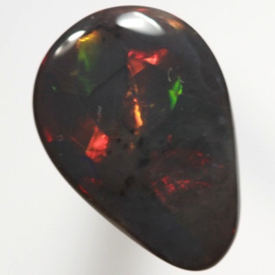SOLID BLACK OPAL Bright, rich blood red jumping always 